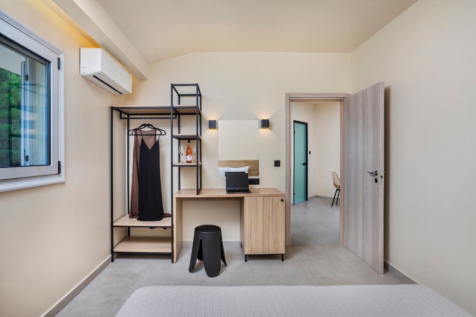 Bedroom desk and open wardrobe