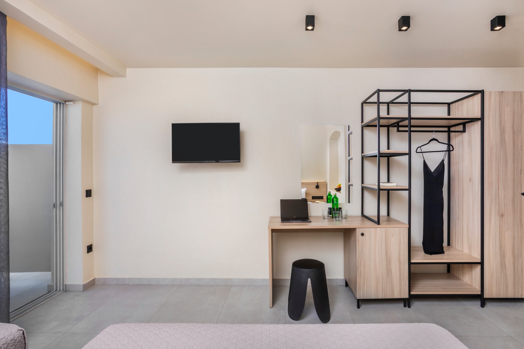 TV, desk and wardrobe area