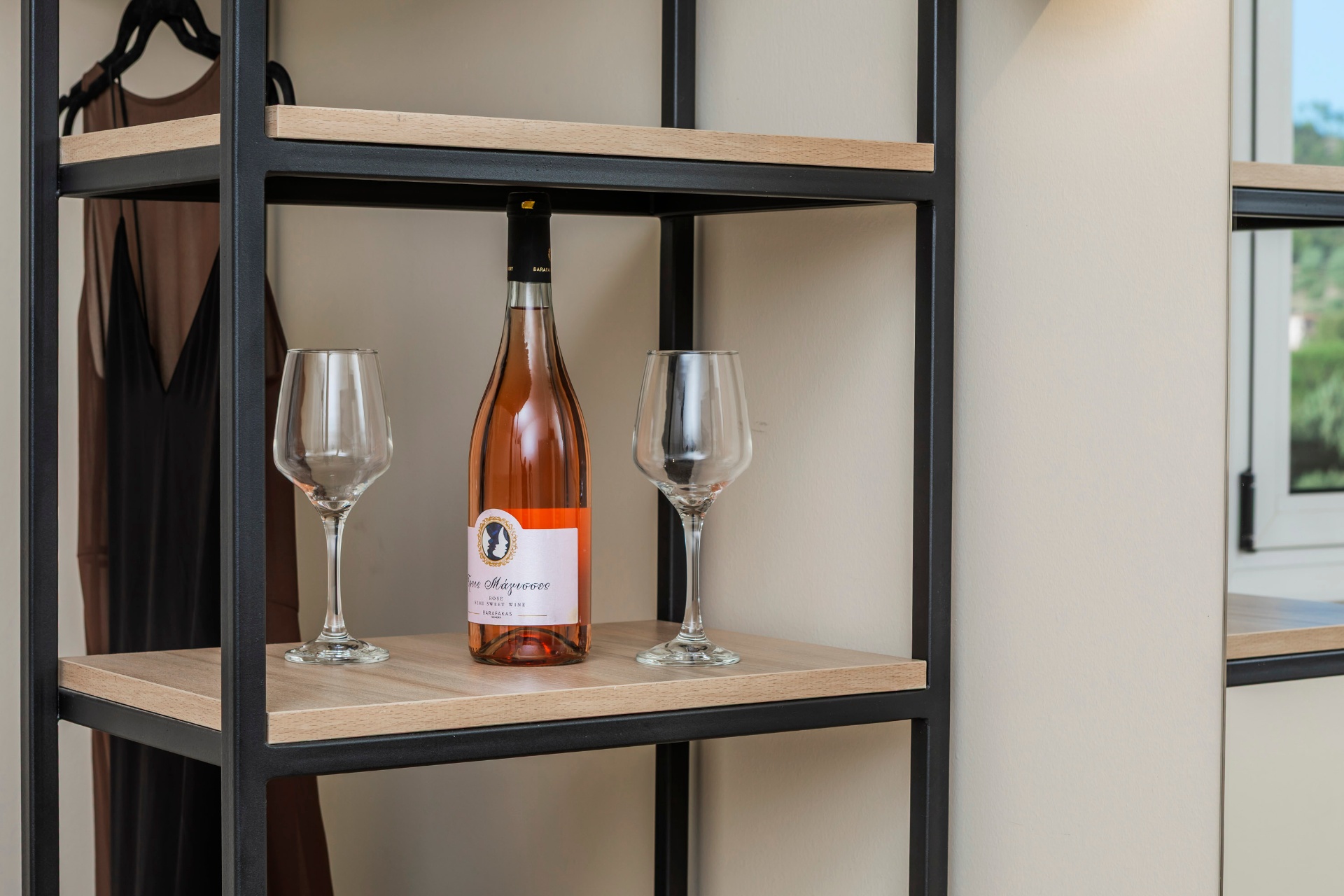 Welcome wine and glasses detail on shelving